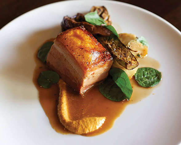 Source: 002houston, Seared pork belly with grilled vegetables in a pecan pomesco sauce